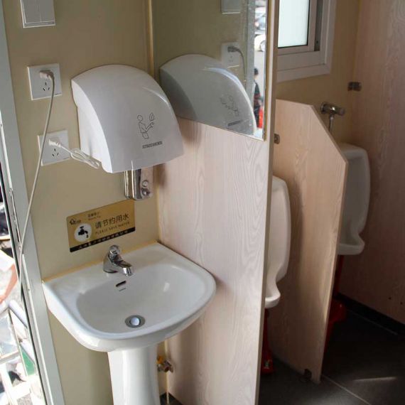 Baño público prefabricado con casa de contenedores de paquete plano - FPCH013